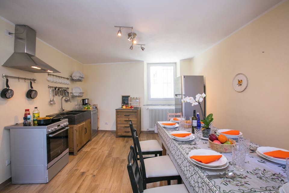 Family Townhome, 3 Bedrooms, Balcony, Mountainside (Plesio Rustico Panoramica) | Private kitchen | Coffee/tea maker, oven, stovetop, dishwasher