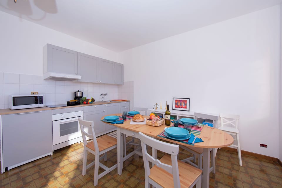 Family Apartment, Multiple Bedrooms, Mountainside (Balcone di Perledo) | Private kitchen | Fridge, microwave, oven, stovetop