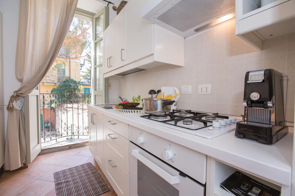Family Apartment, 1 Bedroom, Microwave (Casa Al Prato Apt. A) | Private kitchen | Coffee/tea maker, fridge, microwave, oven
