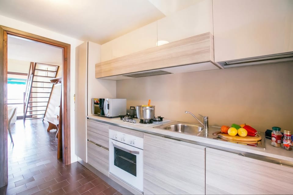 Family Apartment, Multiple Bedrooms, 2 Bathrooms, Mountainside (Cadenabbia Vista Lago) | Private kitchen | Full-size fridge, microwave, oven, stovetop