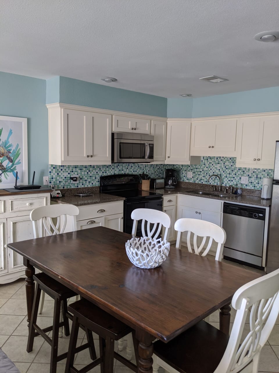Large kitchen dining table with seating for 6.