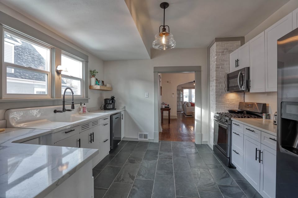Ample counter space and light make meal prep simple and comfortable.