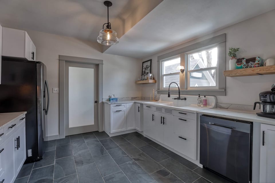 Bright and functional, the kitchen makes cooking or grabbing a snack simple