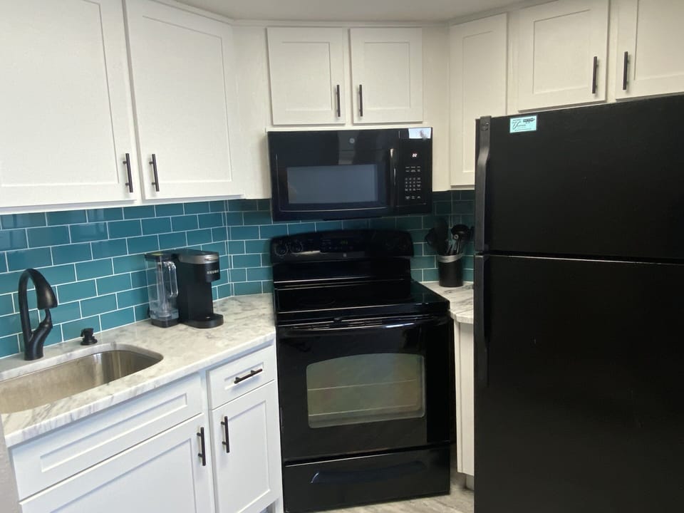 All new modern fixtures and finishings faucet, backsplash, counter
