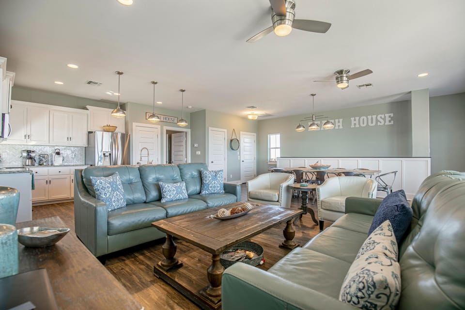 Open Living/Dining/Kitchen with beach/ocean views.