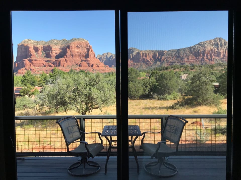Balcony with bistro set and grill