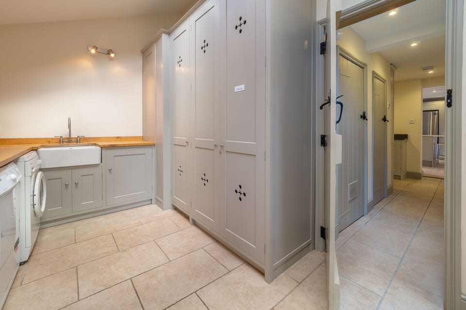 Ground floor: Boot room with washing machine and tumble dryer