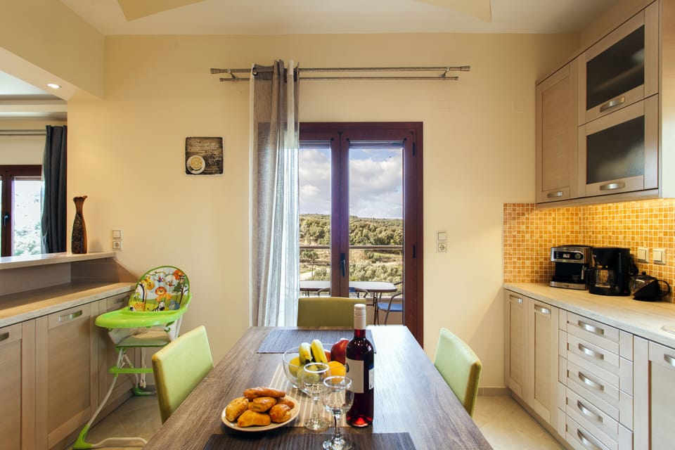 The kitchen leads to the outside balcony