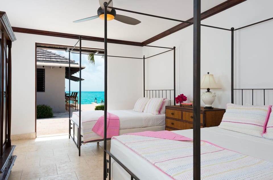 The third bedroom has its own entrance and views of the ocean and pool.