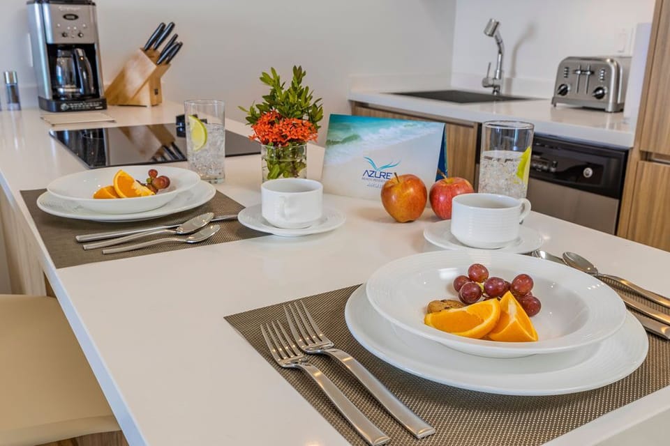 Wake up to fresh fruit and coffee in your fully equipped kitchen, perfect for preparing light meals or enjoying breakfast at the counter before exploring the area.