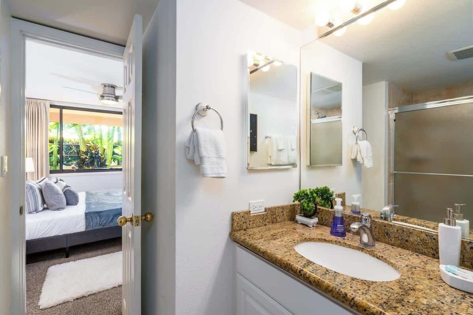 Feel at home in our clean, stylish bathroom with thoughtful touches and modern amenities