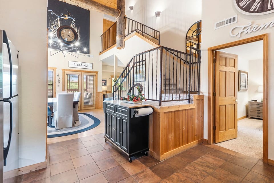 Open Floor Plan with Steps Leading to the Second Bedroom