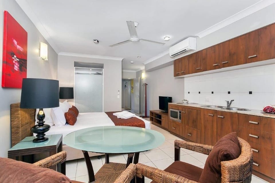 Deluxe Studio, 1 King Bed, Pool Access, Ground Floor | Living area | Flat-screen TV
