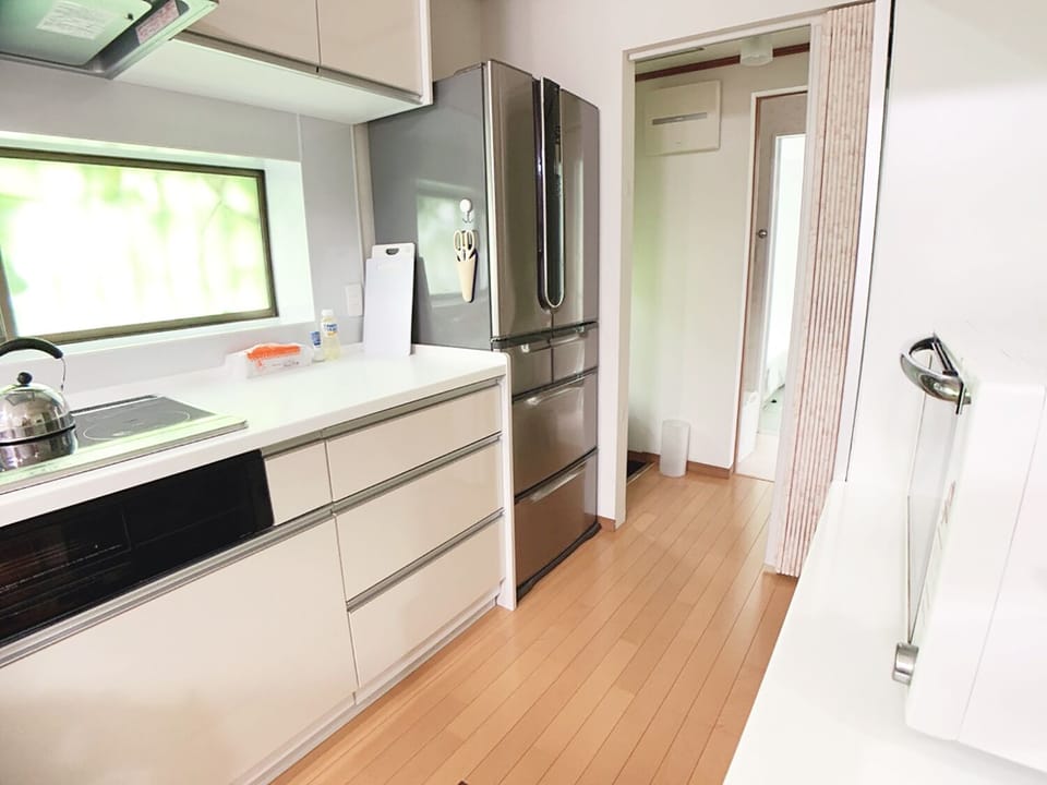 3 Bedroom 2 Story House with Balcony, Non Smoking | Private kitchenette | Coffee/tea maker, fridge, microwave, cookware/dishes/utensils