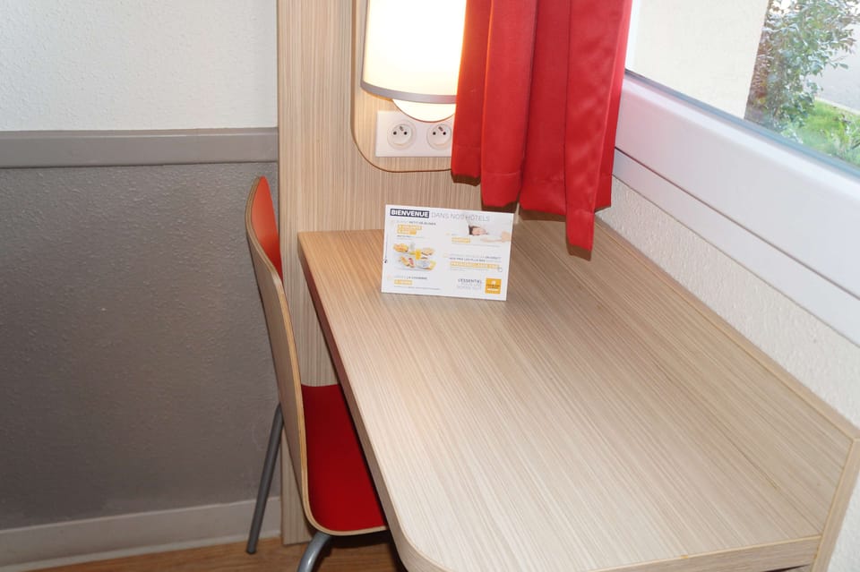 Desk, blackout drapes, soundproofing, free WiFi