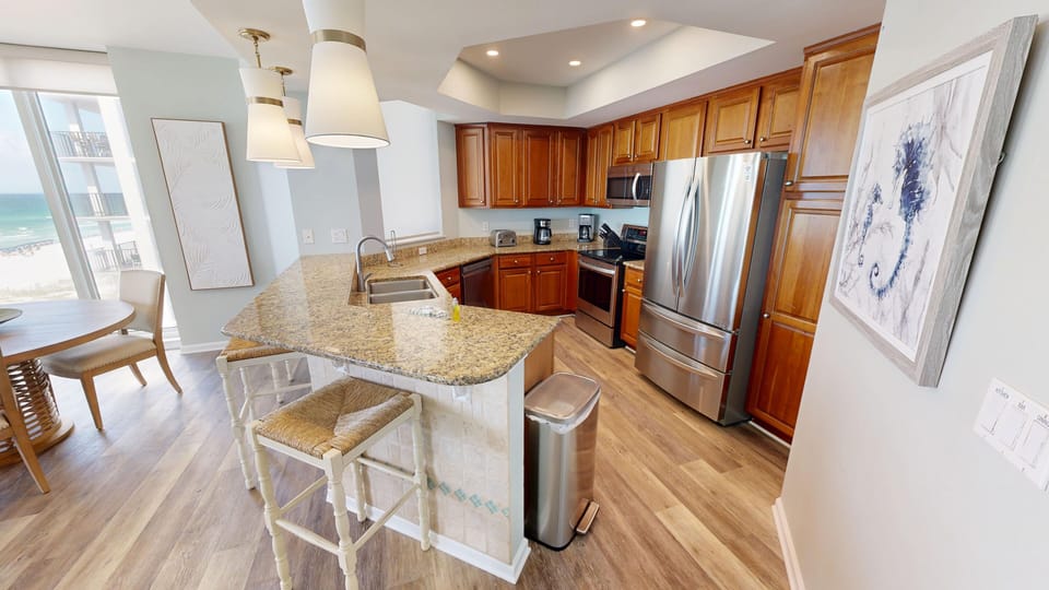 Condo, 4 Bedrooms | Private kitchen | Fridge, microwave, oven, dishwasher