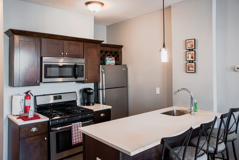 Kitchen with stove and other amenities