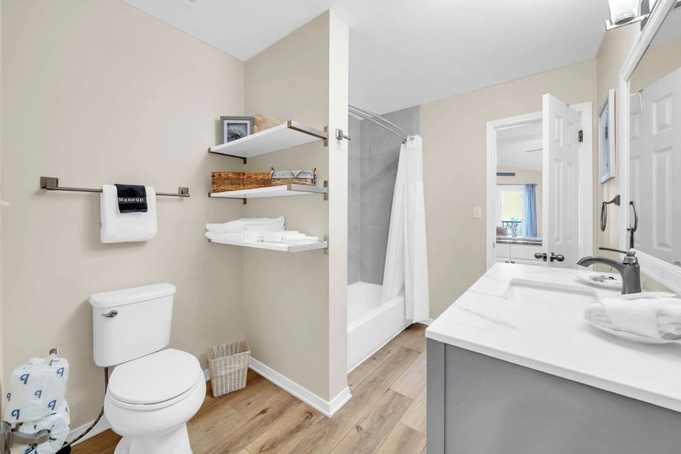Shelves to keep your towels, makeup, or sunscreen!