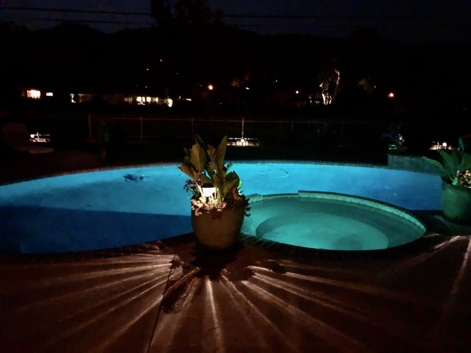 Evening pool and hot tub.
