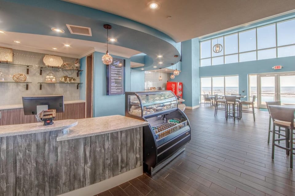 Indulge your cravings with delicious snacks and drinks available at the café.