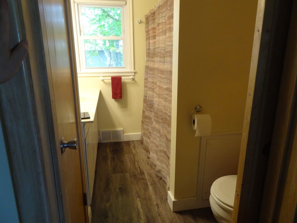 Full bathroom with shower and tub