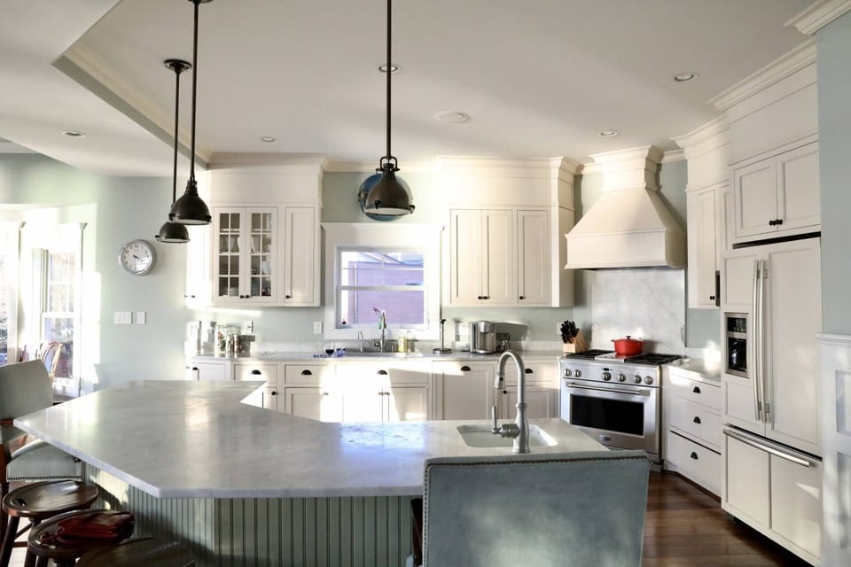 Bright beautiful gourmet kitchen overlooking dining and living rooms