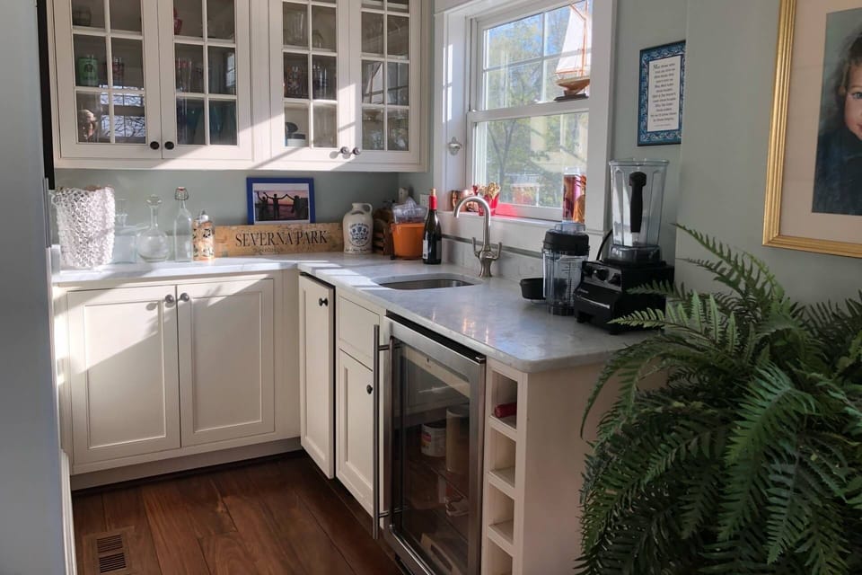 Full wetter with beverage fridge off the Main Floor Family Room