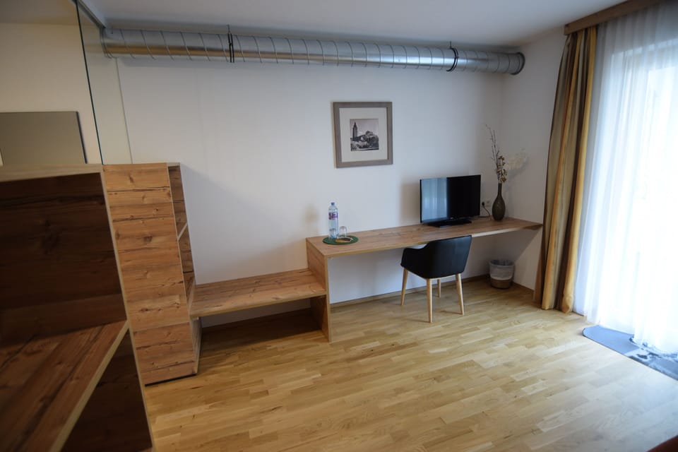 Family Double Room | Living area | 50-cm flat-screen TV with cable channels, TV