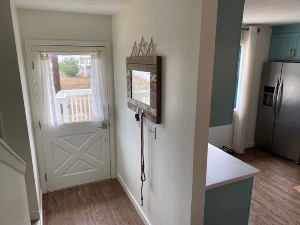 Cozy entrance of home, convenient spot for hanging keys, leash, etc.