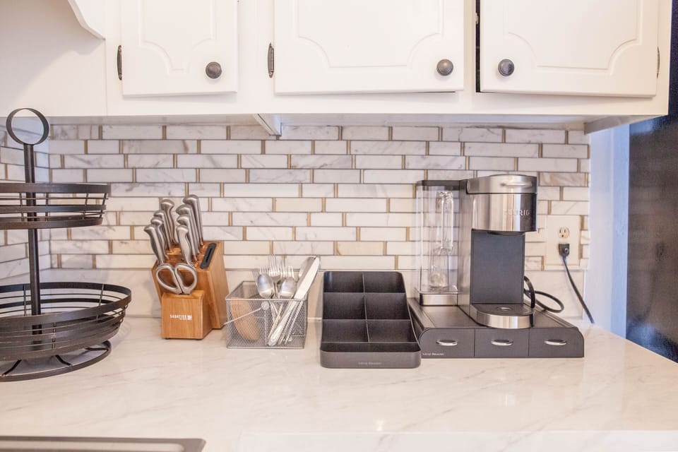 Keurig coffee maker . Enjoy decaf and Kirkland medium roast coffee .