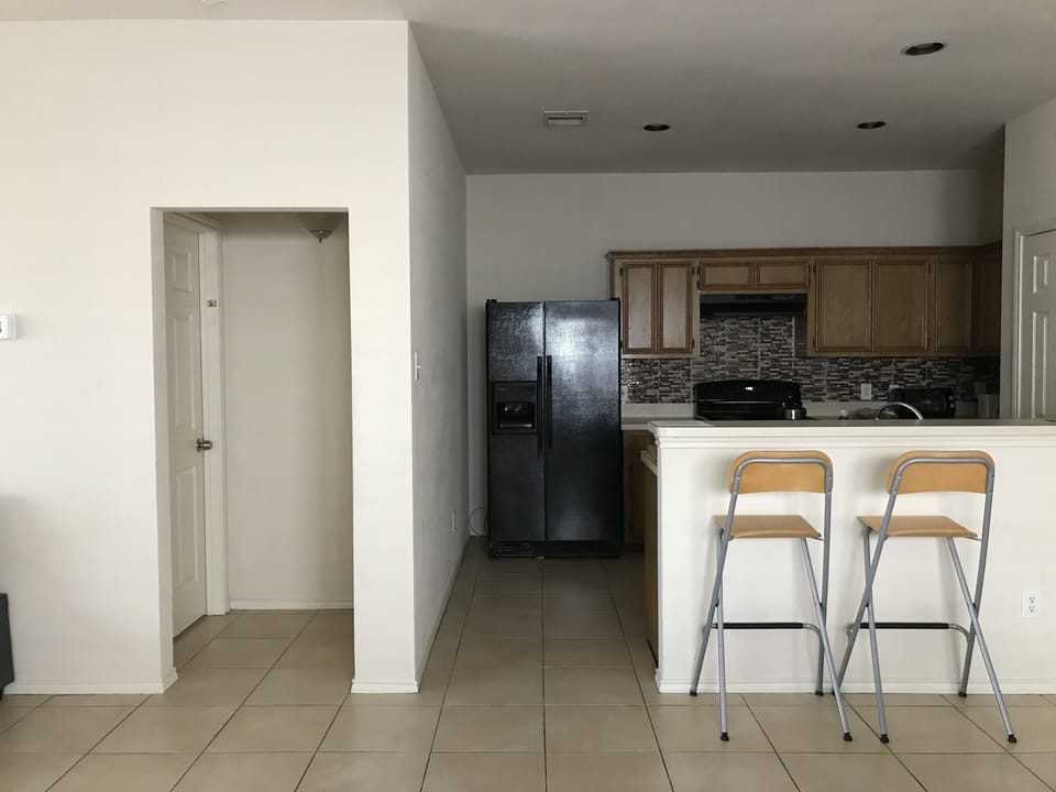 Master bedroom entrance and kitchen 