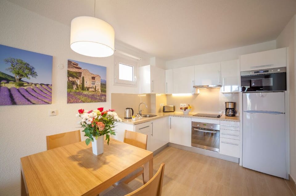 Sun-filled dining space with a welcoming vibe, perfect for shared meals.