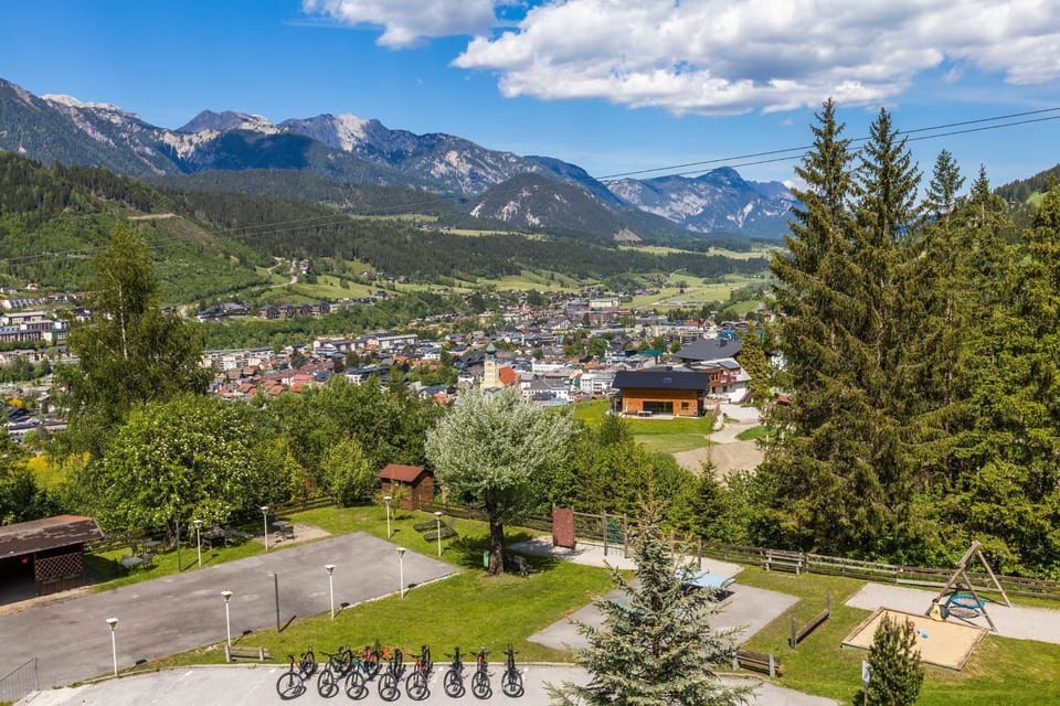 Panoramic mountain views, lush greenery, and easy access to local outdoor activities.