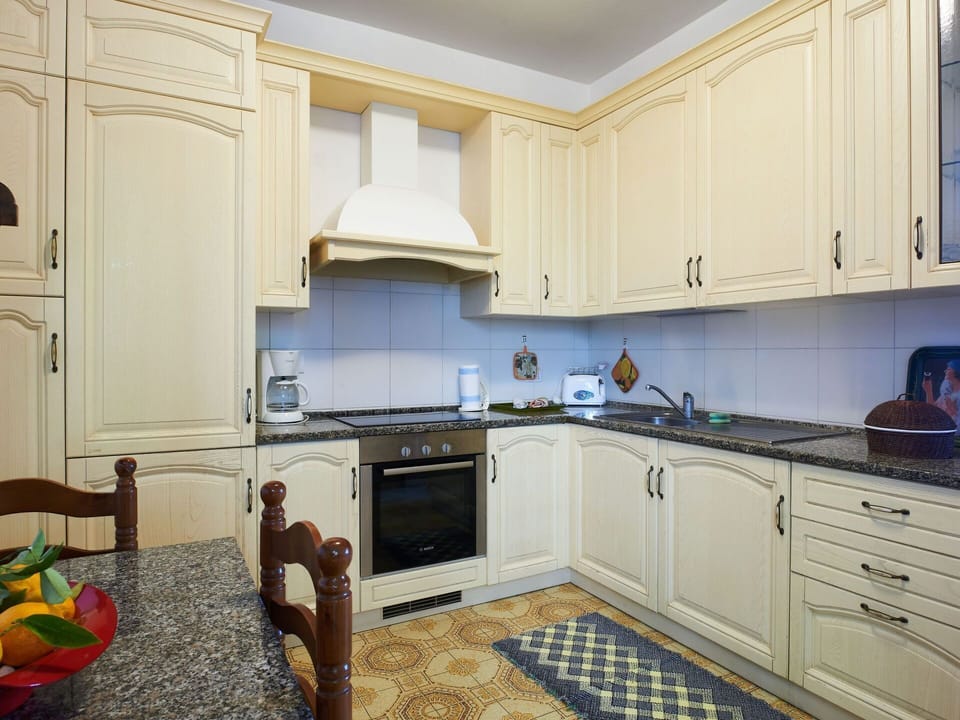 Cabinetry, Countertop, Property, Sink, Kitchen, Kitchen Stove, Wood, Home Appliance, Interior Design, Flooring
