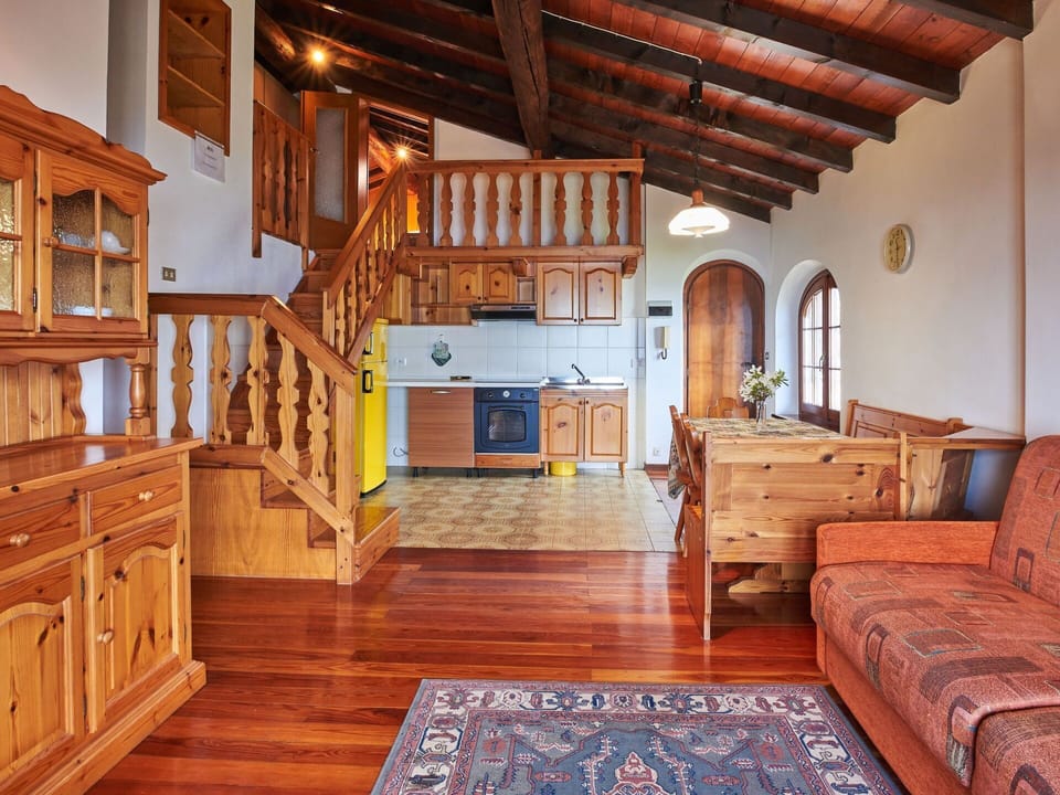 Furniture, Cabinetry, Couch, Wood, Interior Design, Flooring, Floor, Wood Stain, Living Room, Wall