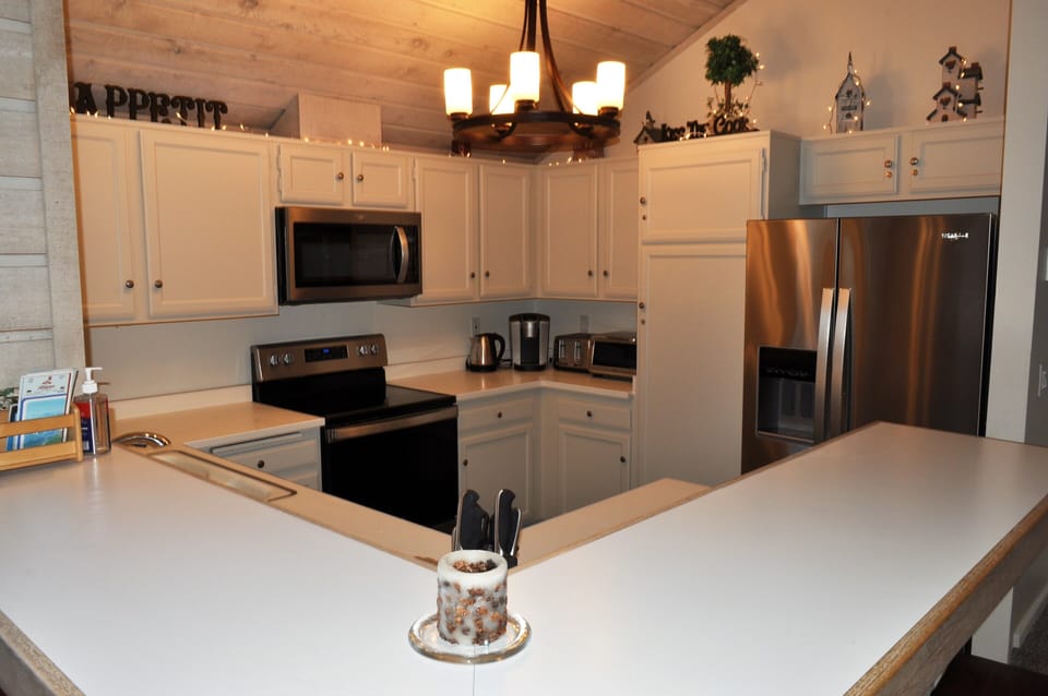 Kitchen with all new stainless steel Whirlpool appliances