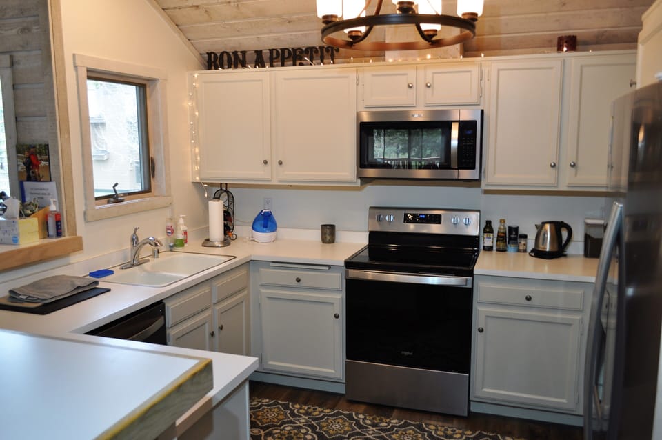 Fully stocked kitchen with all new stainless steel Whirlpool appliances