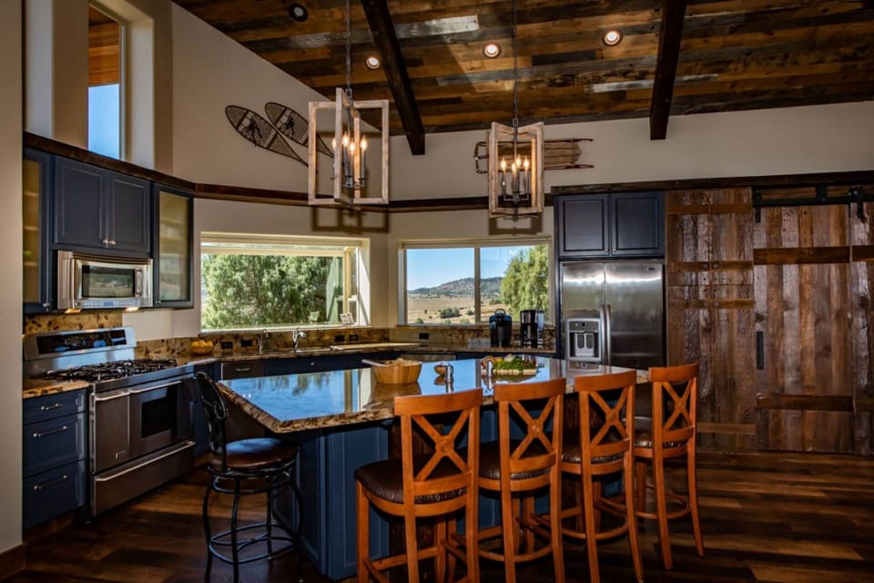 State of the Art Kitchen with million-dollar views. Located on the main floor, steps away from the living space and massive covered patios.