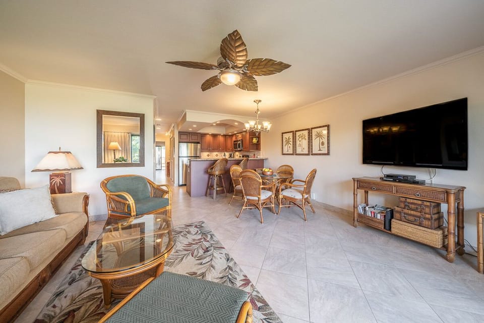 Living room view to the cozy dining area & kitchen