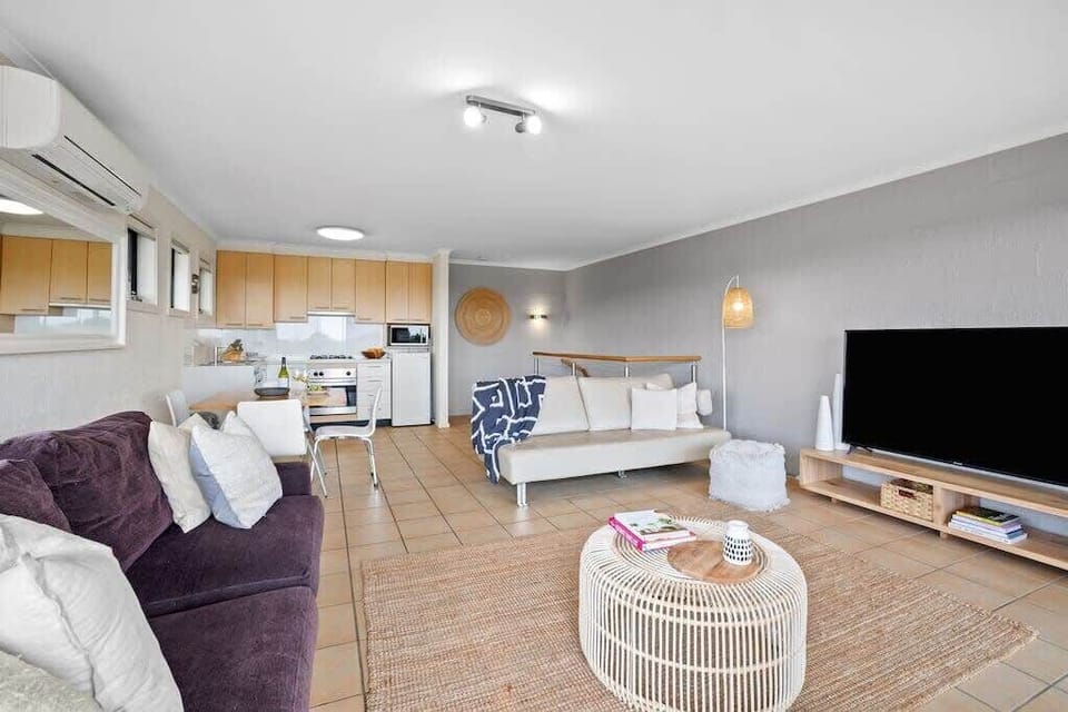 Sink into the couch and enjoy a movie on the TV