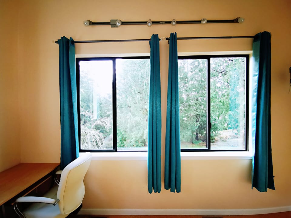 A desk in the living room