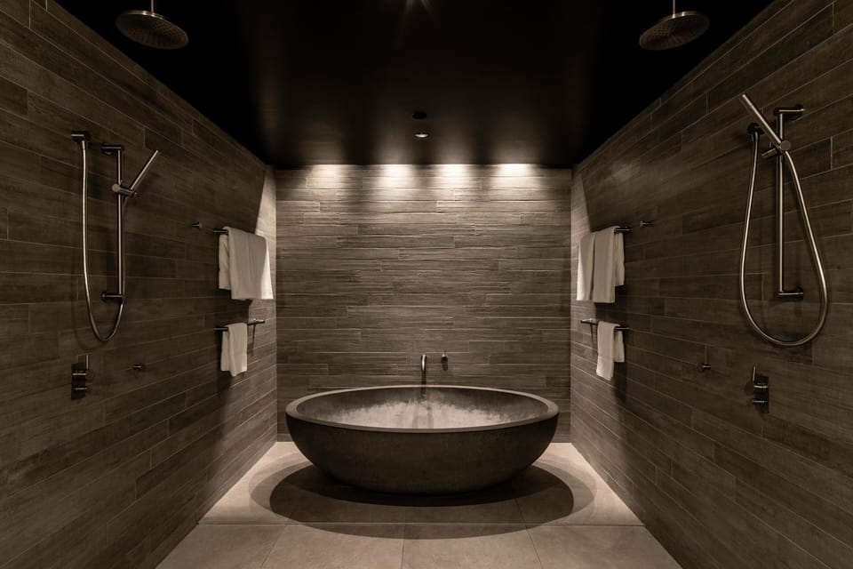 Suite, 1 King Bed (Sanctum) | Bathroom | Designer toiletries, hair dryer, bathrobes, slippers