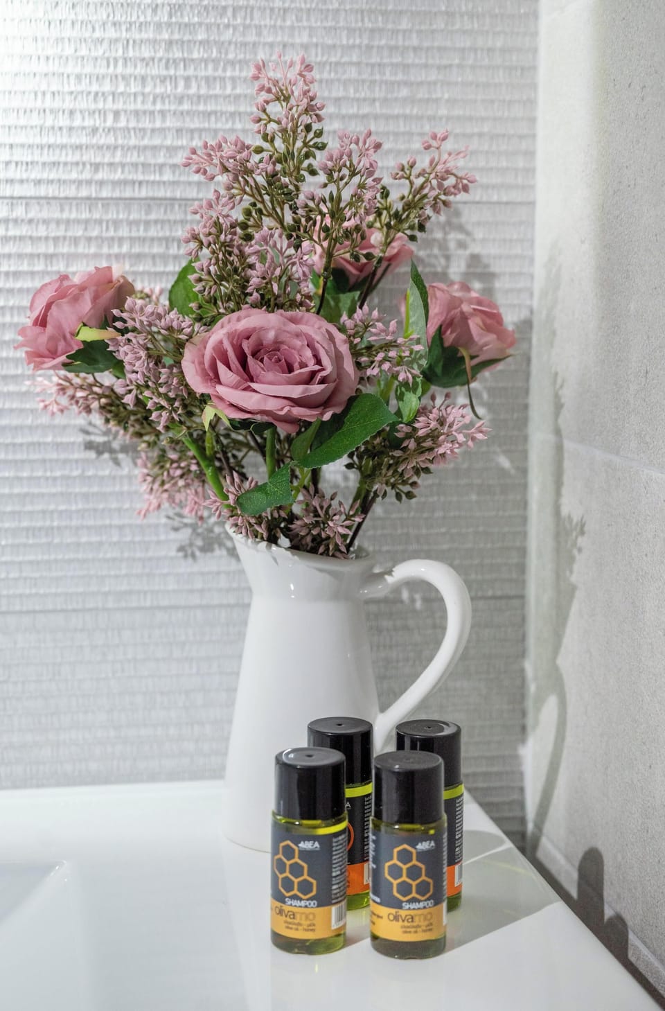 Shower, rainfall showerhead, hair dryer, towels