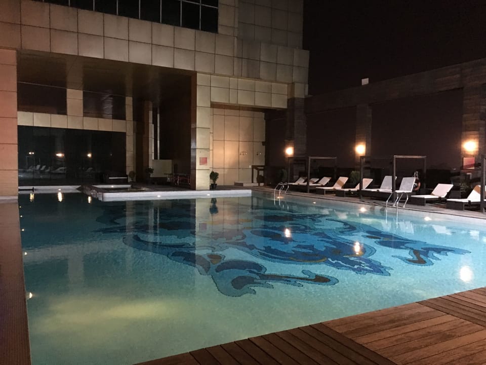 Outdoor pool, open 7:00 AM to 8:00 PM, sun loungers