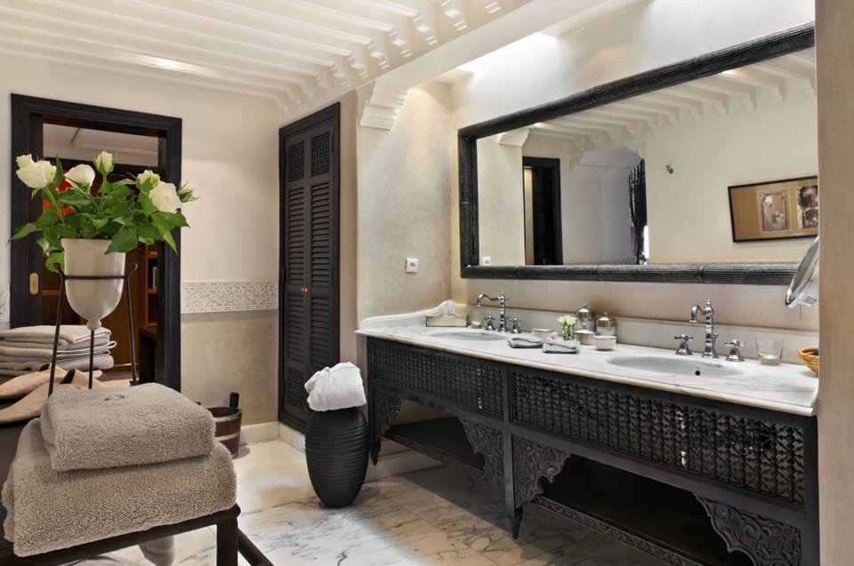 Executive Suite, Balcony, Pool View | Bathroom | Separate tub and shower, free toiletries, hair dryer, bathrobes