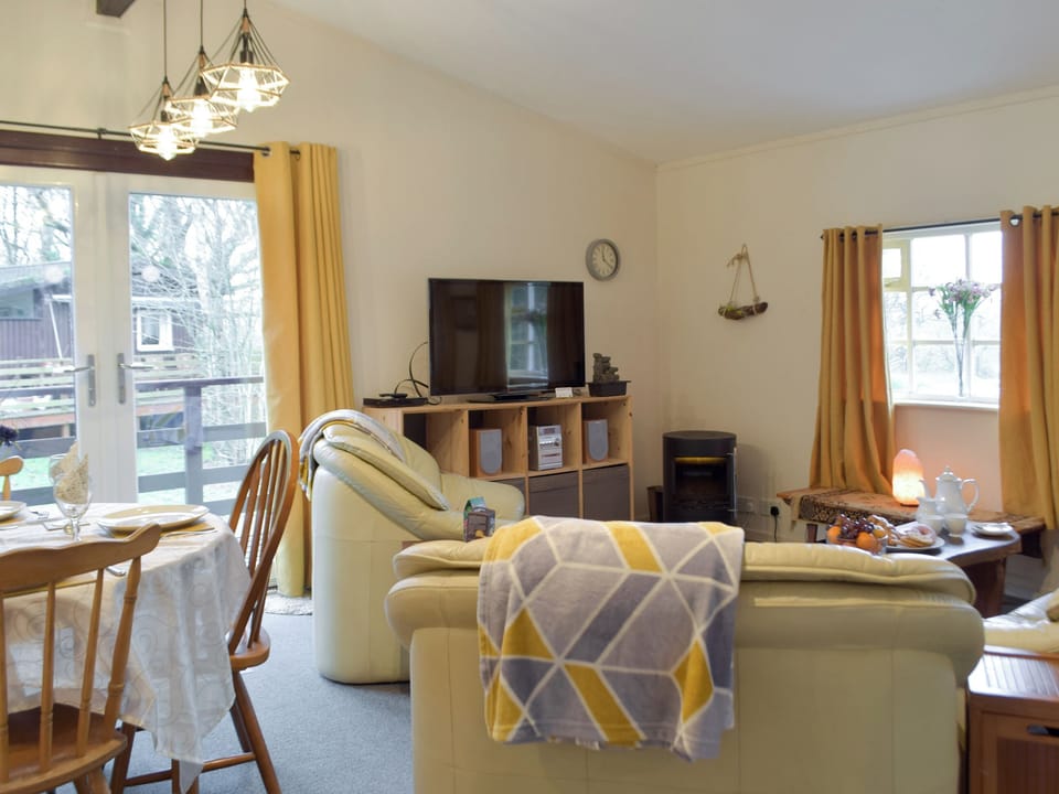 Living room/dining area | Owls About - Torwood Lodges, Cenarth, near Newcastle Emlyn