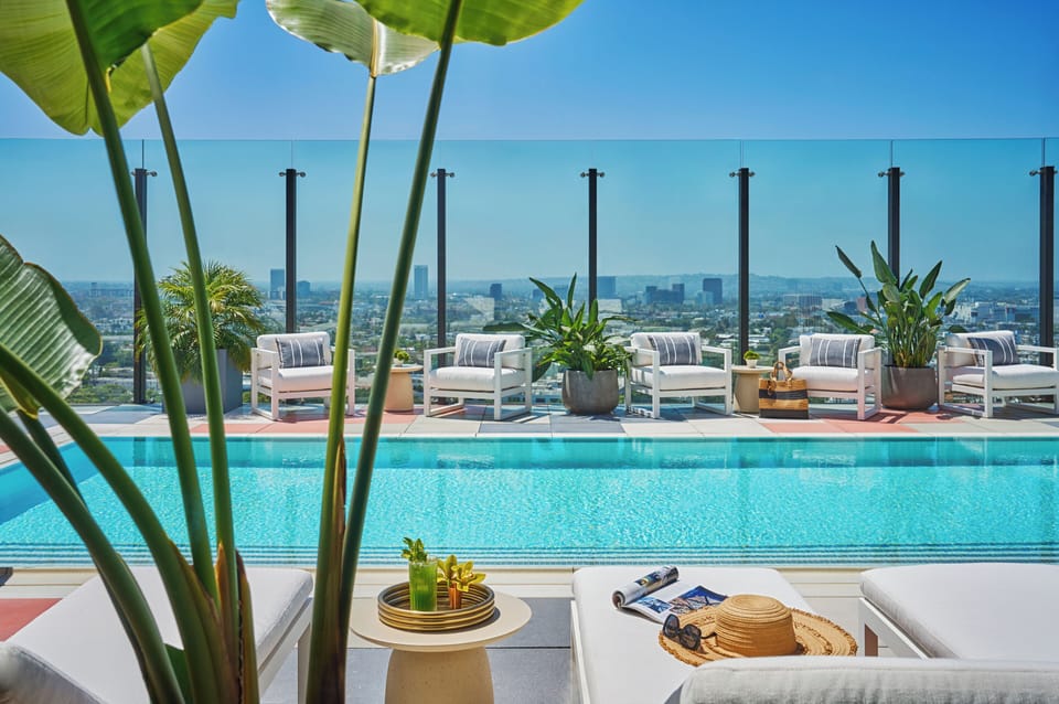 Outdoor pool, open 7:00 AM to 7:00 PM, pool umbrellas, sun loungers