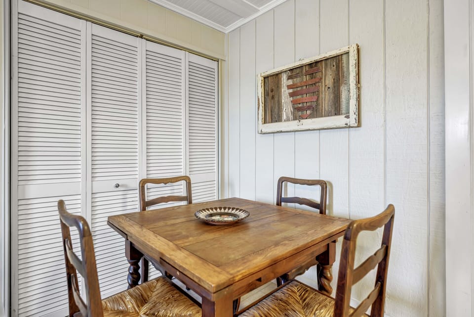 Lower level laundry closet with washer and dryer. 