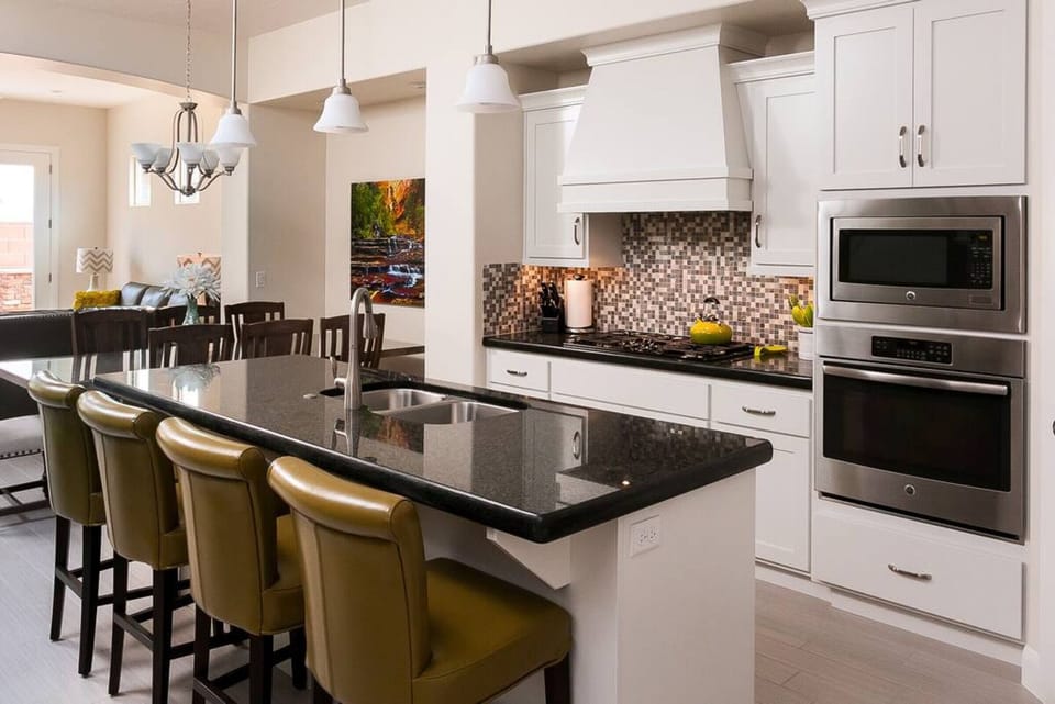 Kitchen is fully stocked & seats 12 - with an additional folding table available