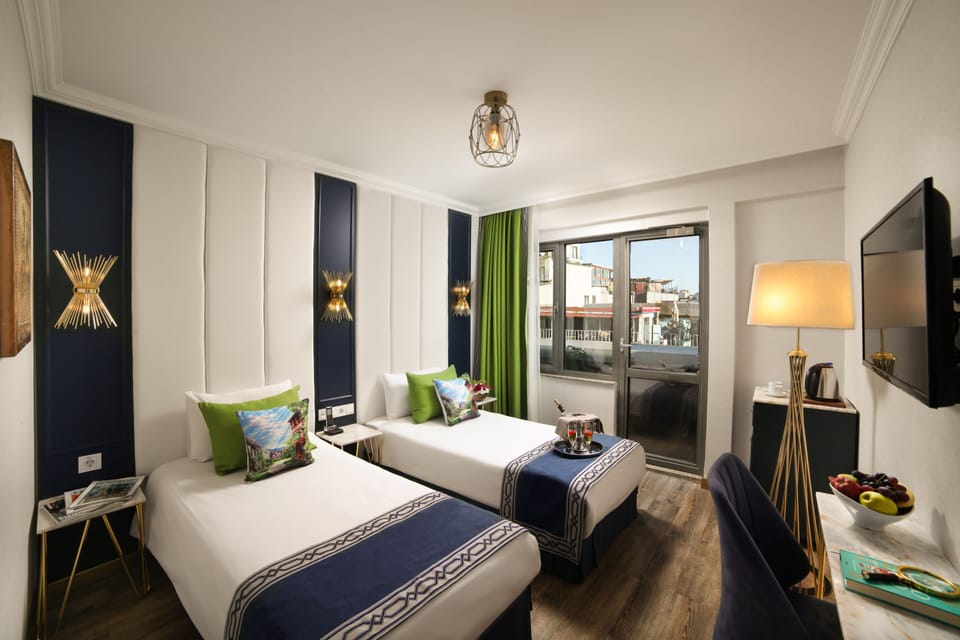 Panoramic Room | Minibar, in-room safe, desk, laptop workspace
